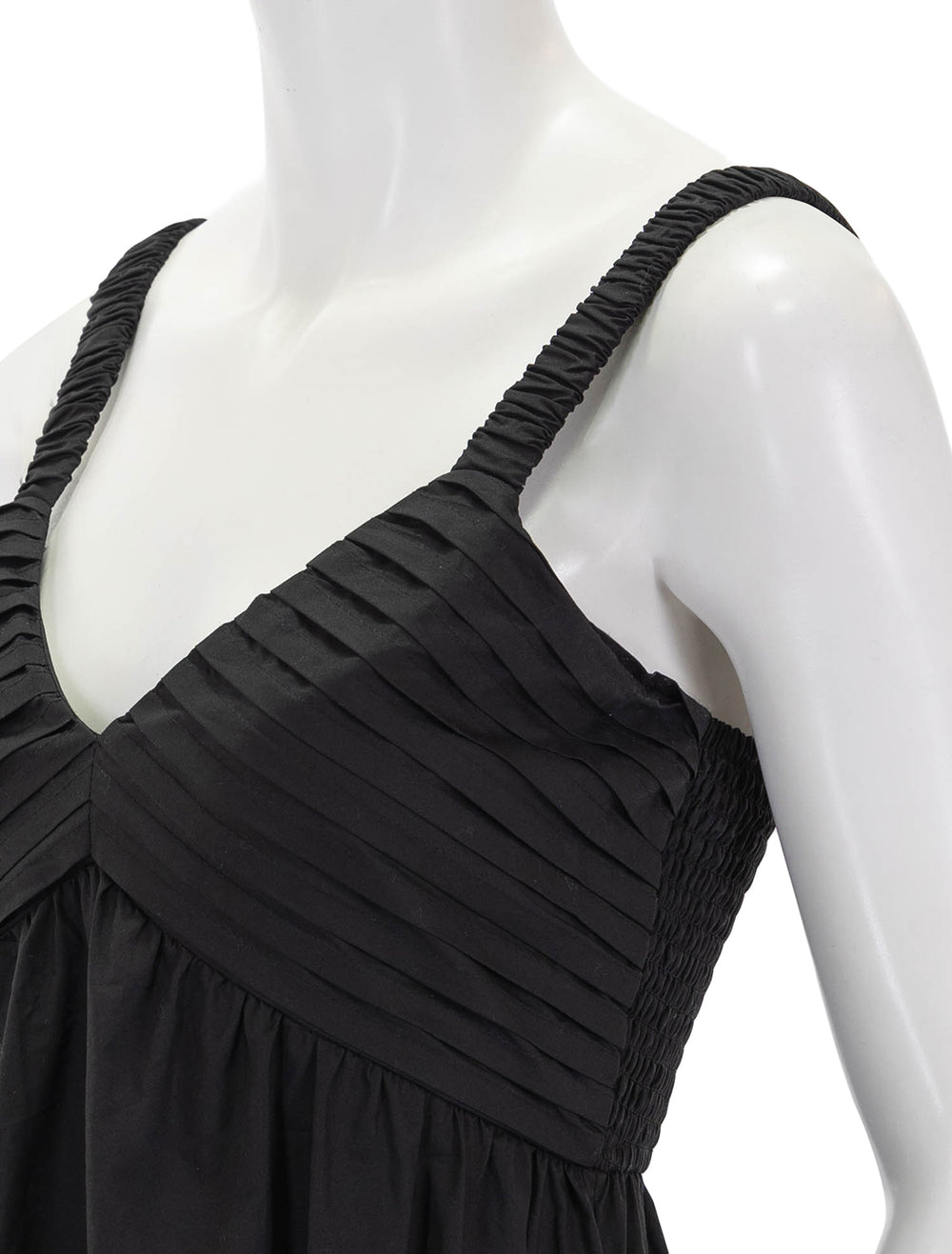 Close-up view of Steve Madden's eloria dress in black.
