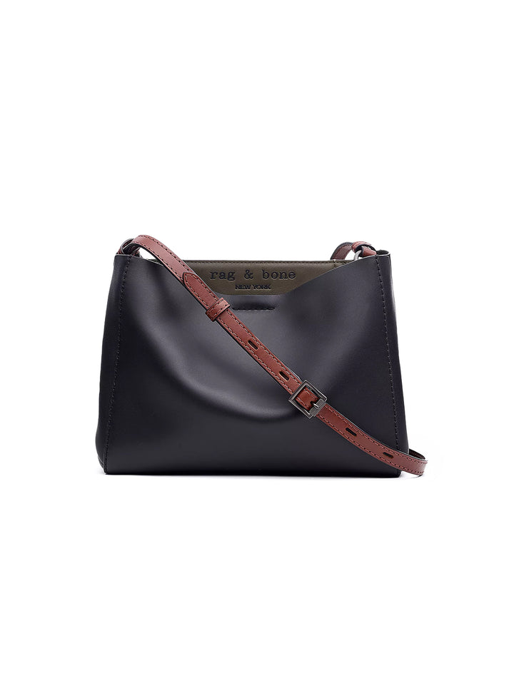Front view of Rag & Bone's passenger crossbody in black and olive.