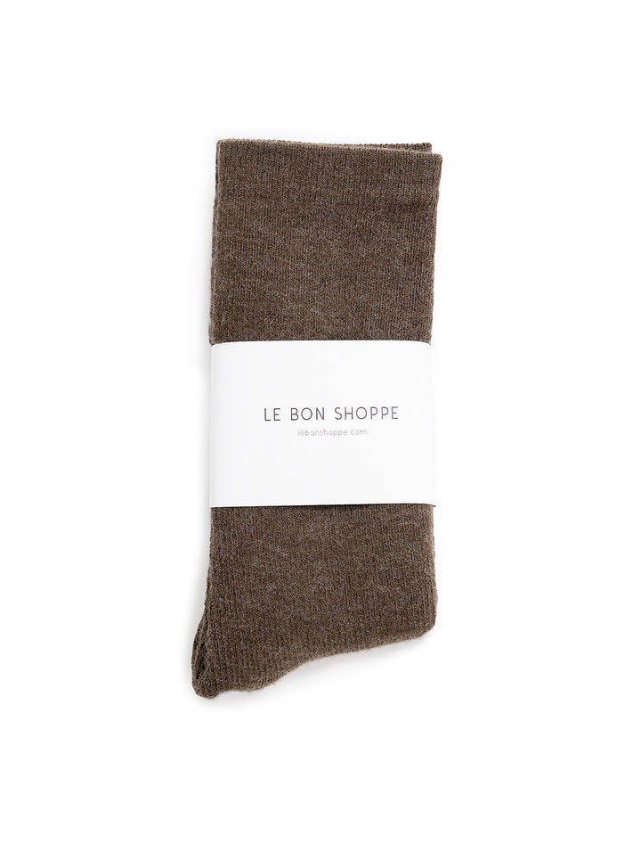 Overhead view of Le Bon Shoppe's camper socks in wood.