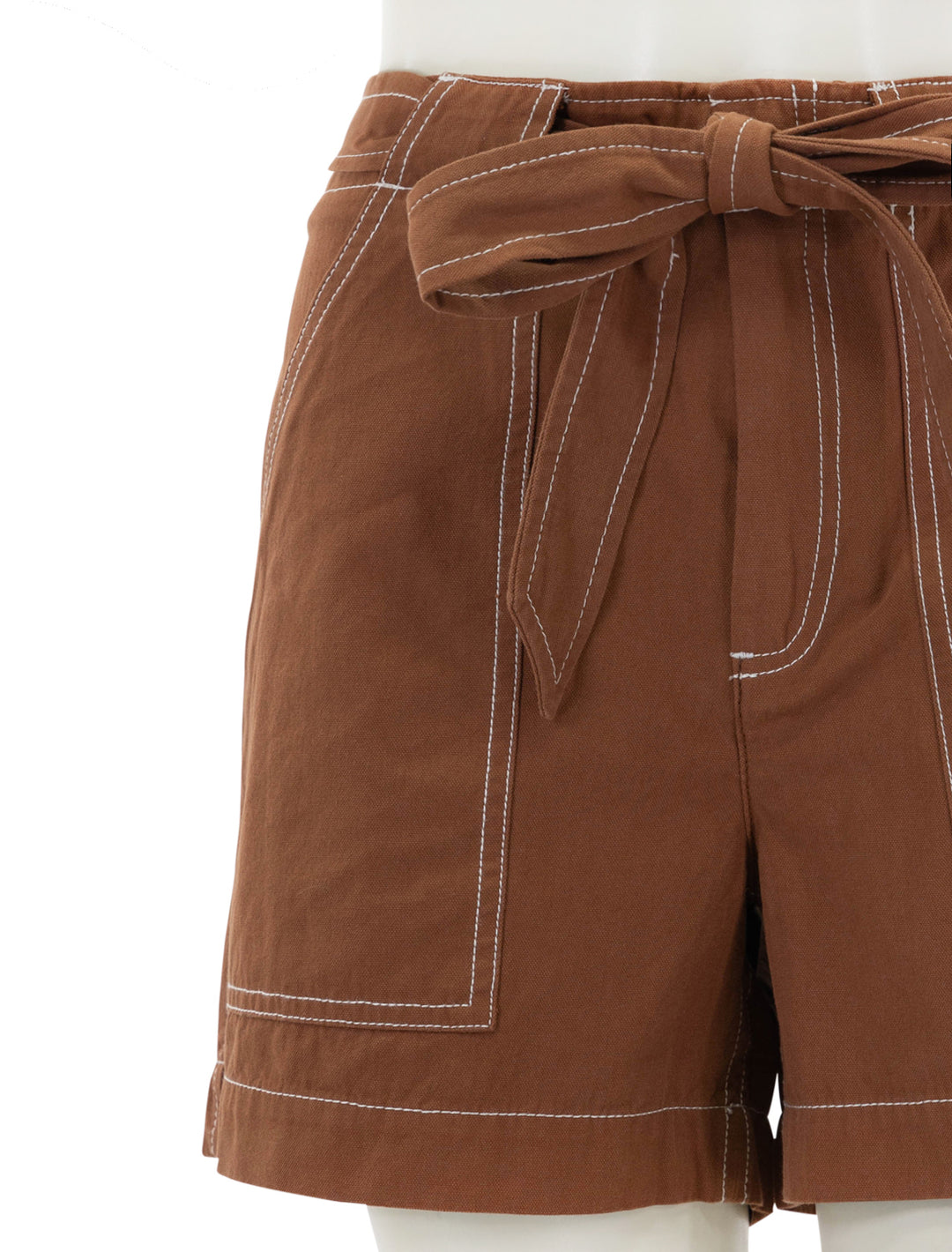 Close-up view of Lilla P.'s belted canvas shorts in bronze.