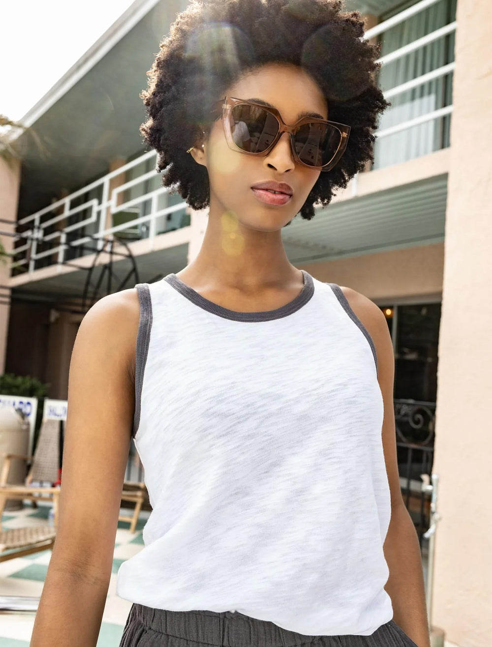 model wearing colorblock tank in white and stingray