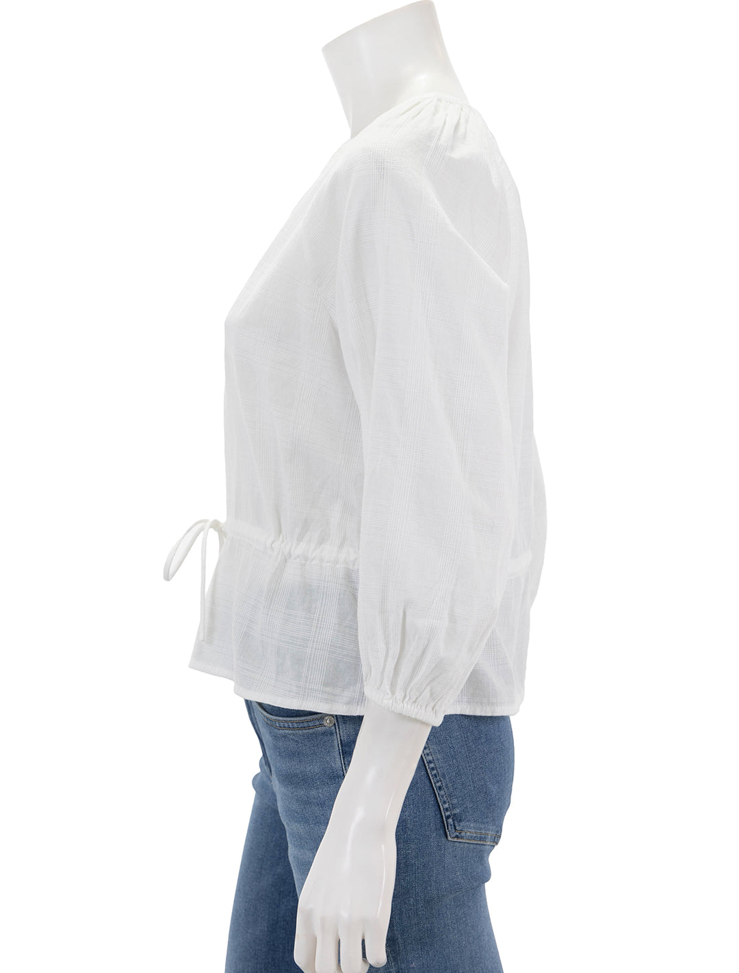 side view of tie waist top in white