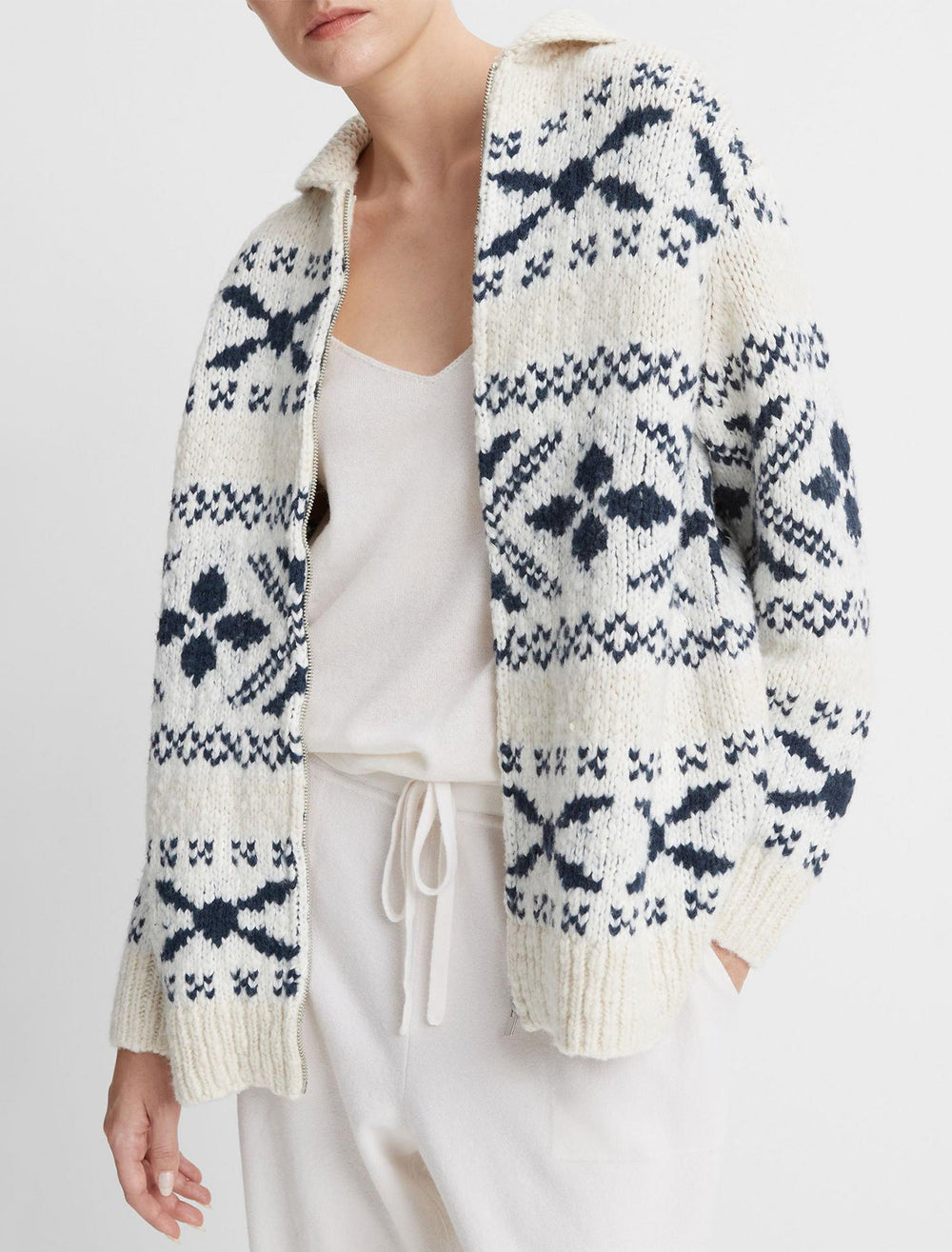 Model wearing Vince's nordic fair isle cardigan in light sand and coastal blue.
