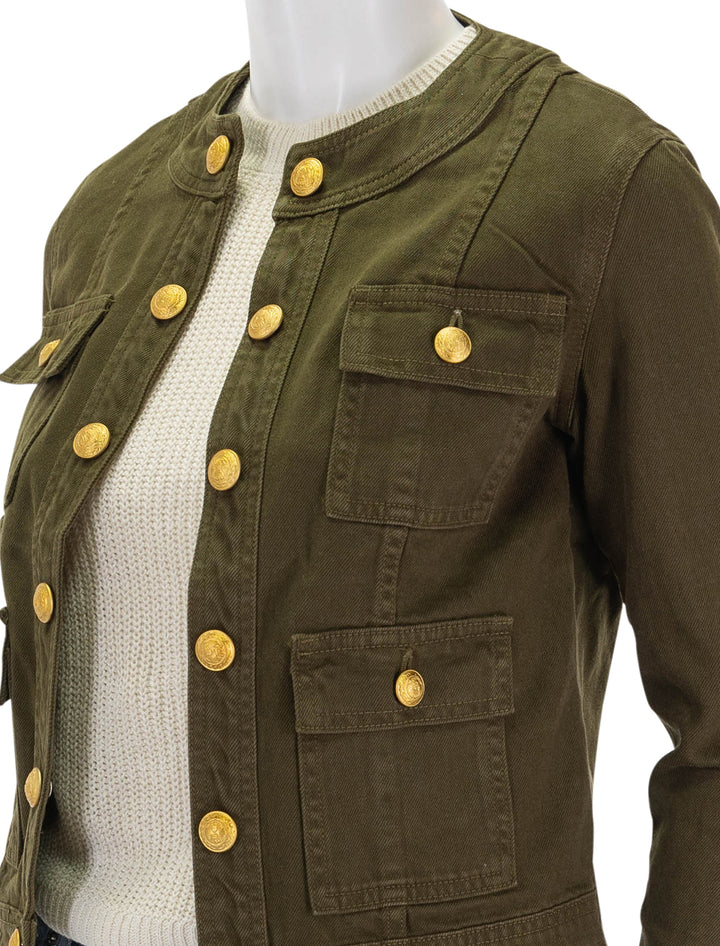 Close-up view of L'Agence's yari collarless jacket in olive grove.