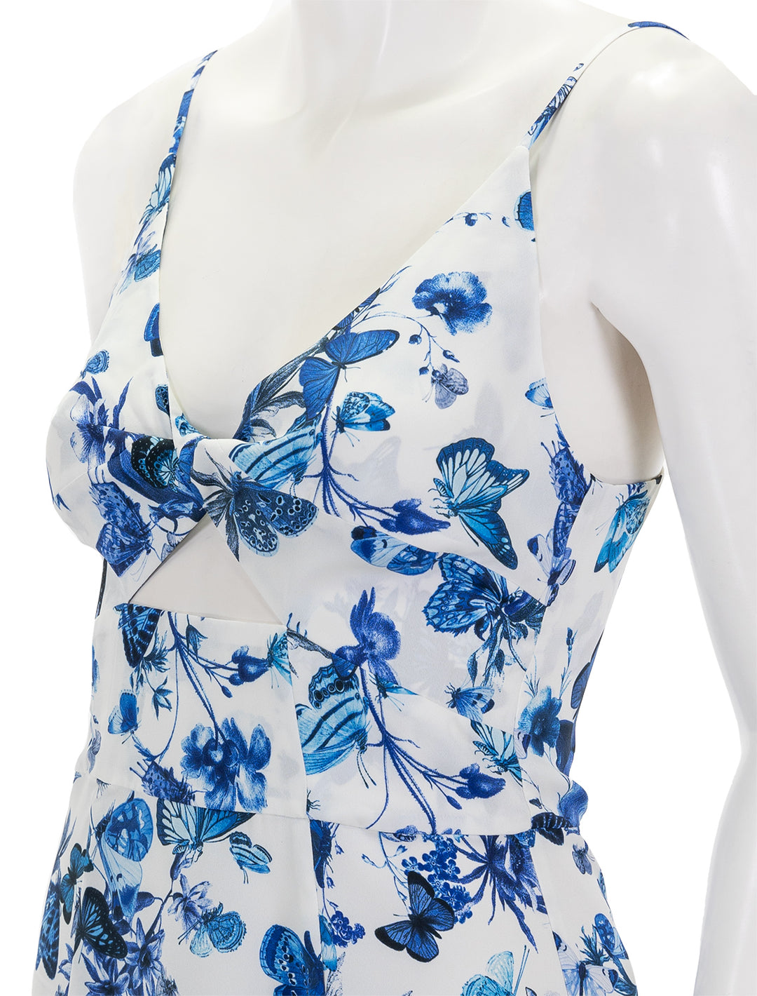 Close-up view of L'agence's porter twisted front dress in white and blue.