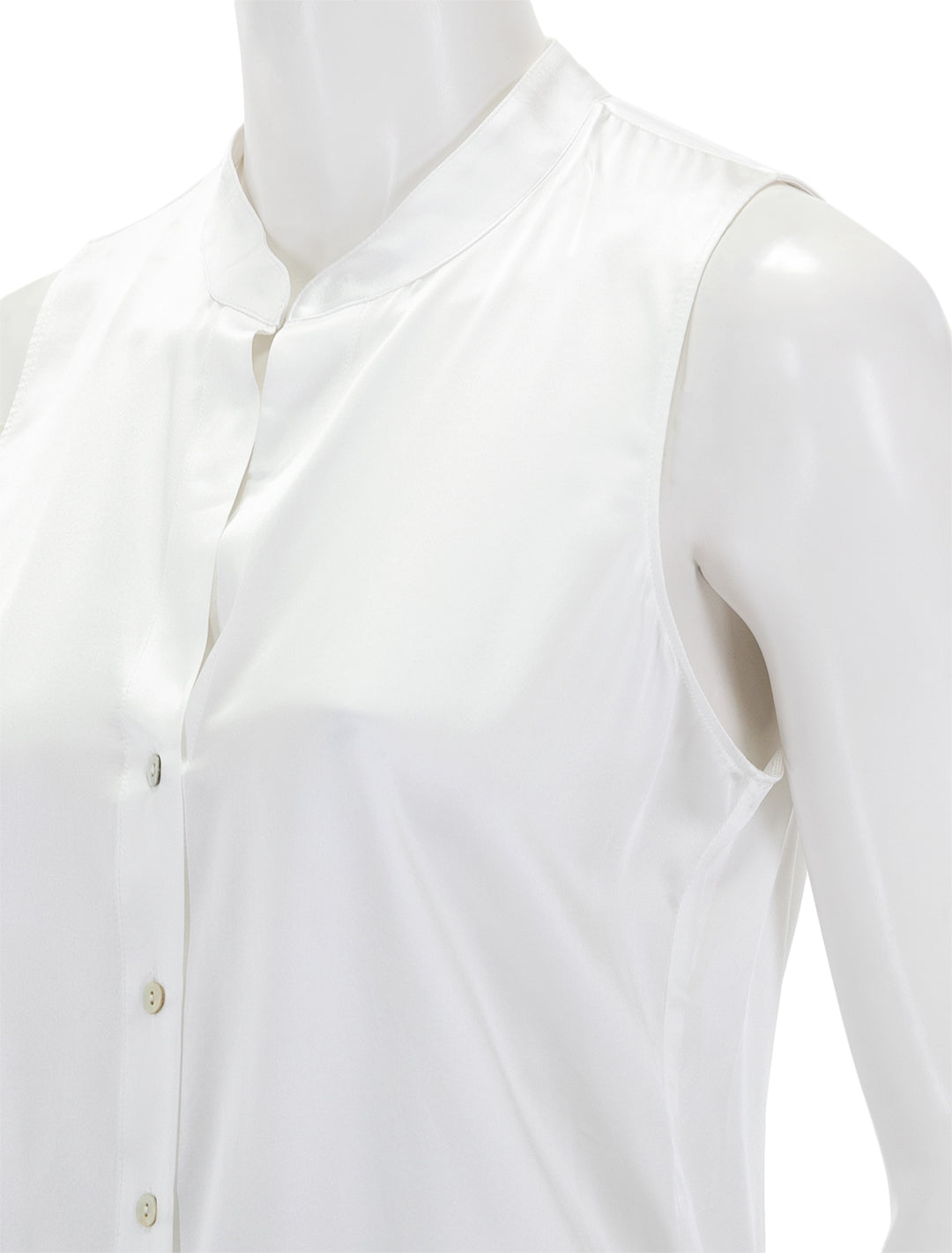 Close-up view of L'agence's hendrix band collar sleeveless blouse in white.