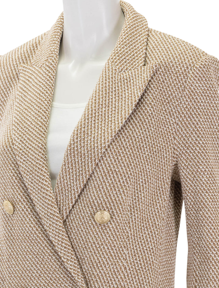 Close-up view of L'agence's riva knit double breasted blazer in tan and ivory.