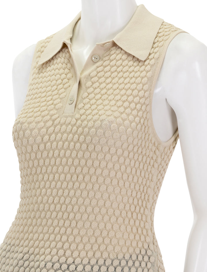 Close-up view of Rag & Bone's georgia sleeveless polo in beige.