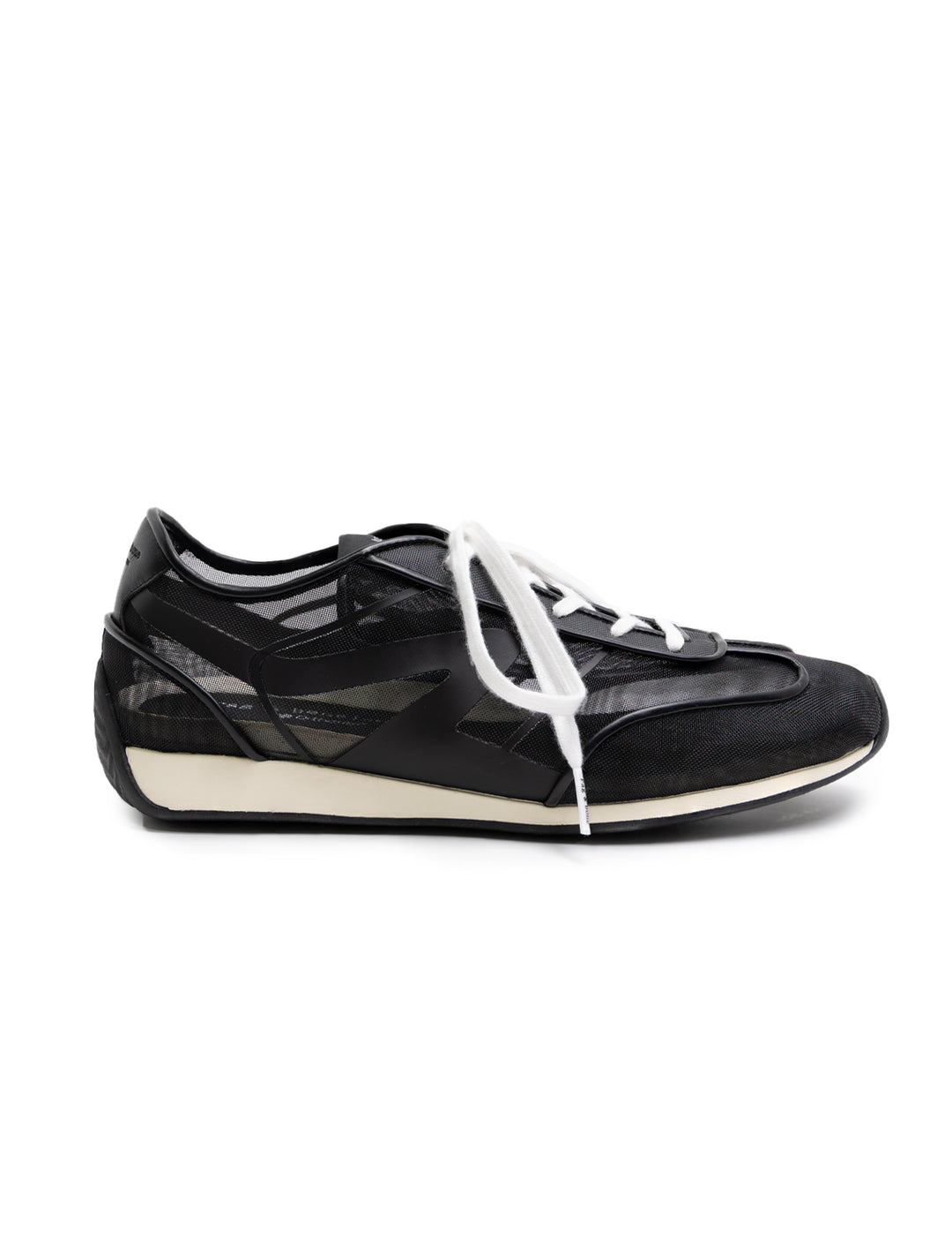 Side view of Rag & Bone's retro runner slim in black mesh.