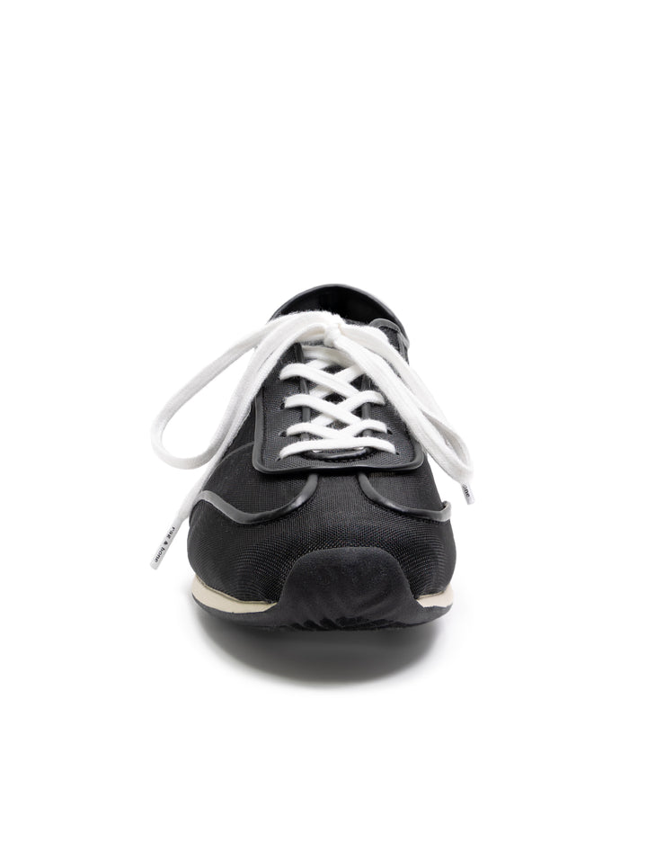 Front view of Rag & Bone's retro runner slim in black mesh.