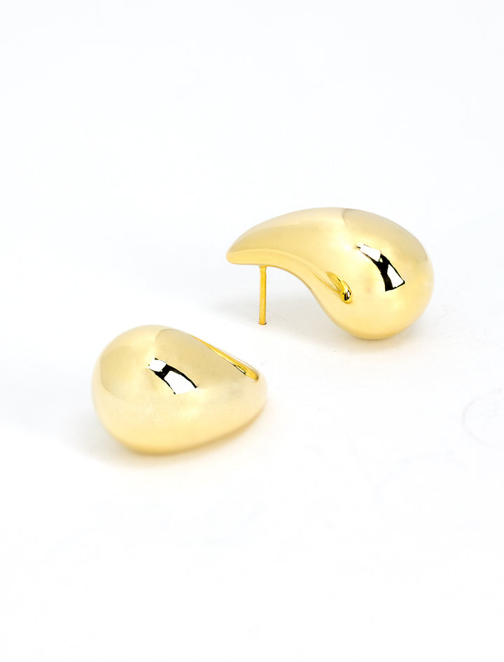 Side angle view of AV Max's Small Puff Teardrop Earrings in Gold.