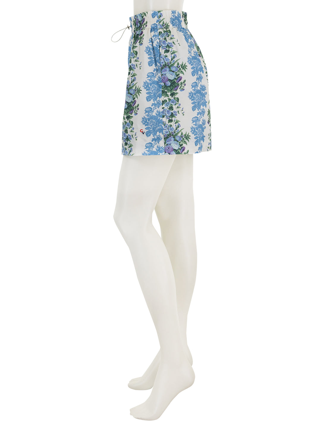 Side view of Clare V.'s theo skirt in blue floral stripe.