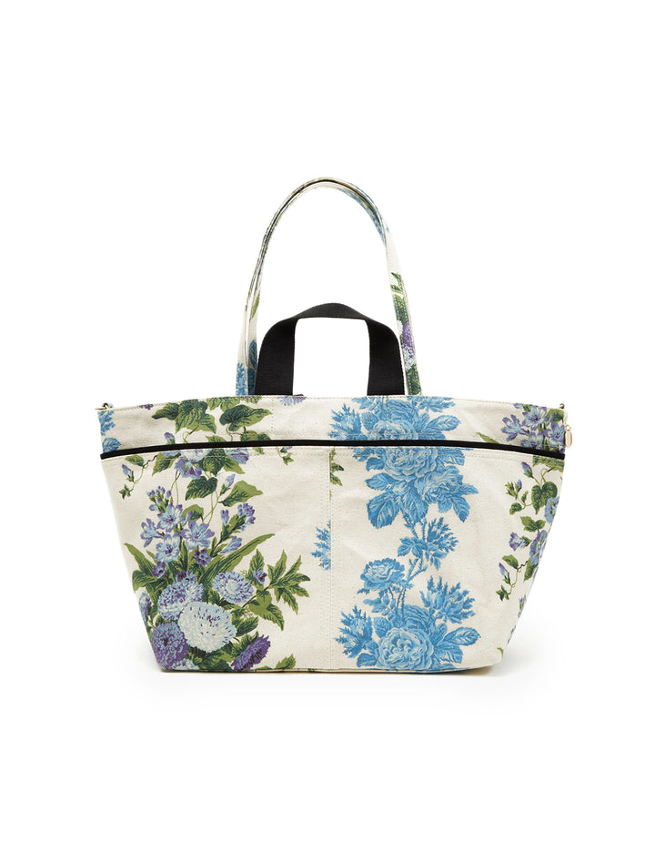 Front view of Clare V.'s poche bateau in blue floral stripe.