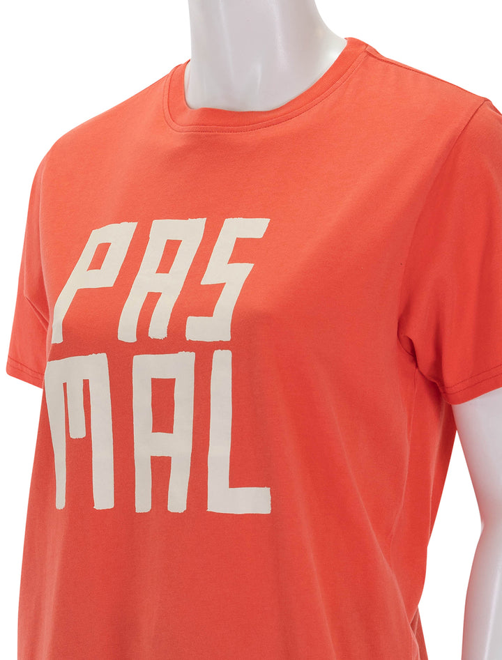 Close-up view of Clare V.'s pas mal tee in sunfaded poppy.