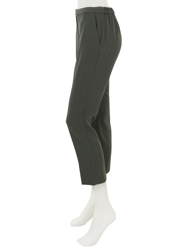 Side view of Theory's treeca pull on pant in dark olive.