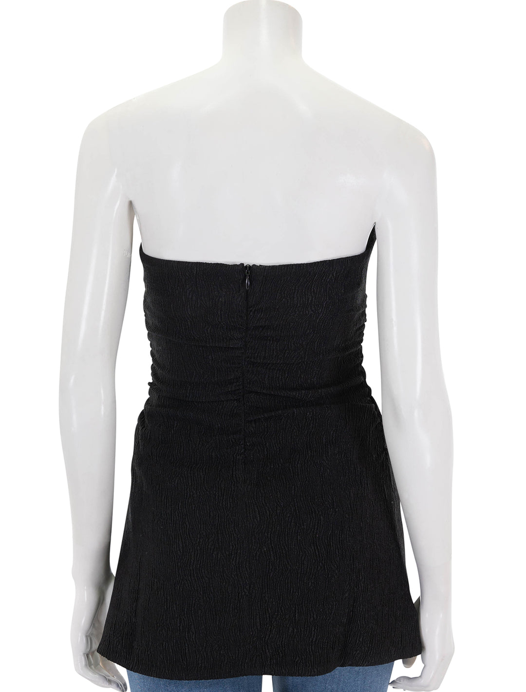 Back view of GANNI's stretch crepe strapless top in black.