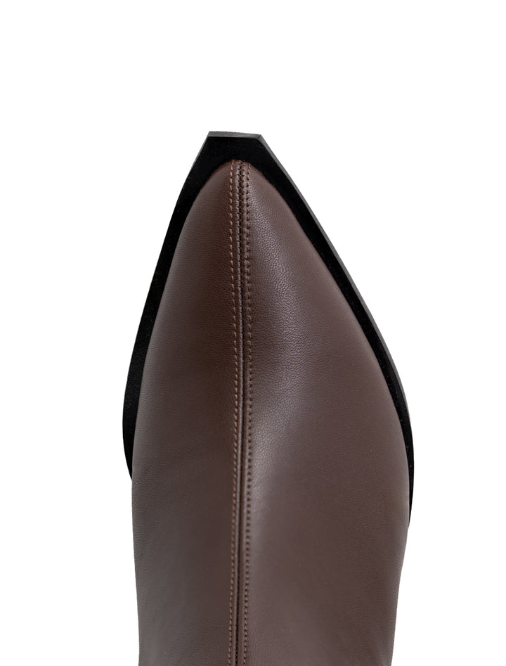 Close-up view of GANNI's feminine buckle chelsea boot in chocolate fondant.