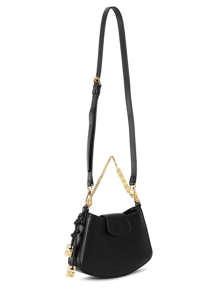 Front angle view of GANNI's ganni mini swing crossbody bag in black with shoulder strap.