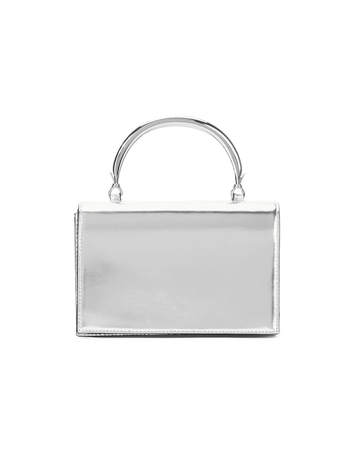 Front view of STAUD's arc evening bag in chrome.