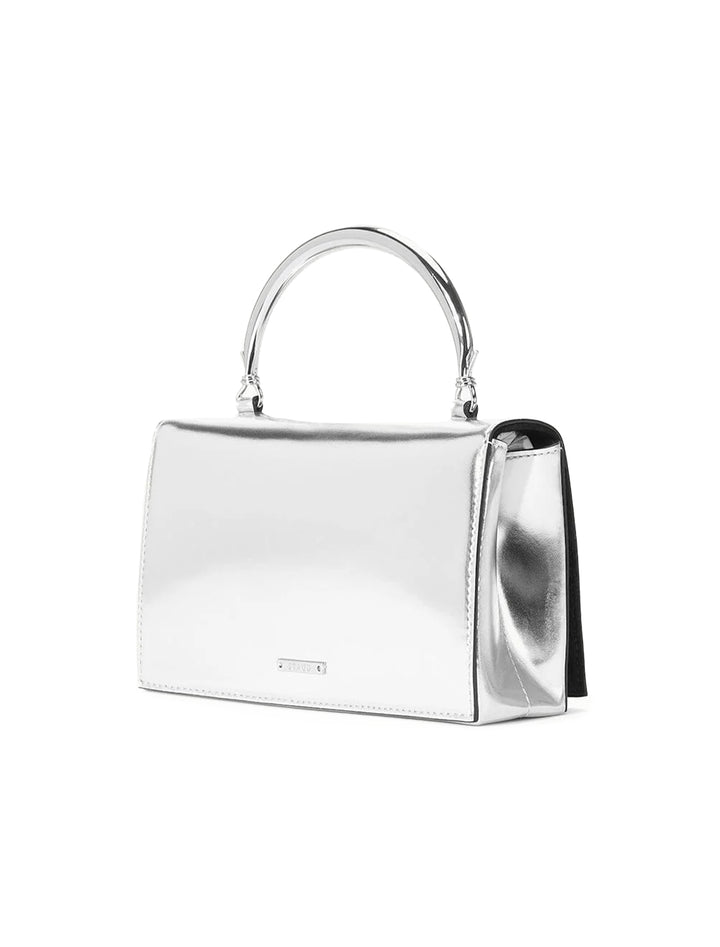 Back angle view of STAUD's arc evening bag in chrome.