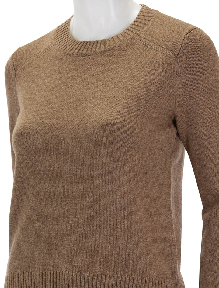 Close-up view of Isabel Marant Etoile's ludma zip accent pullover in camel.