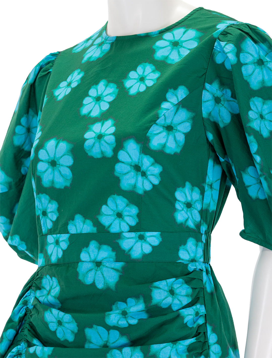 Close-up view of Rhode's pia dress in forest bombay bloom mini.