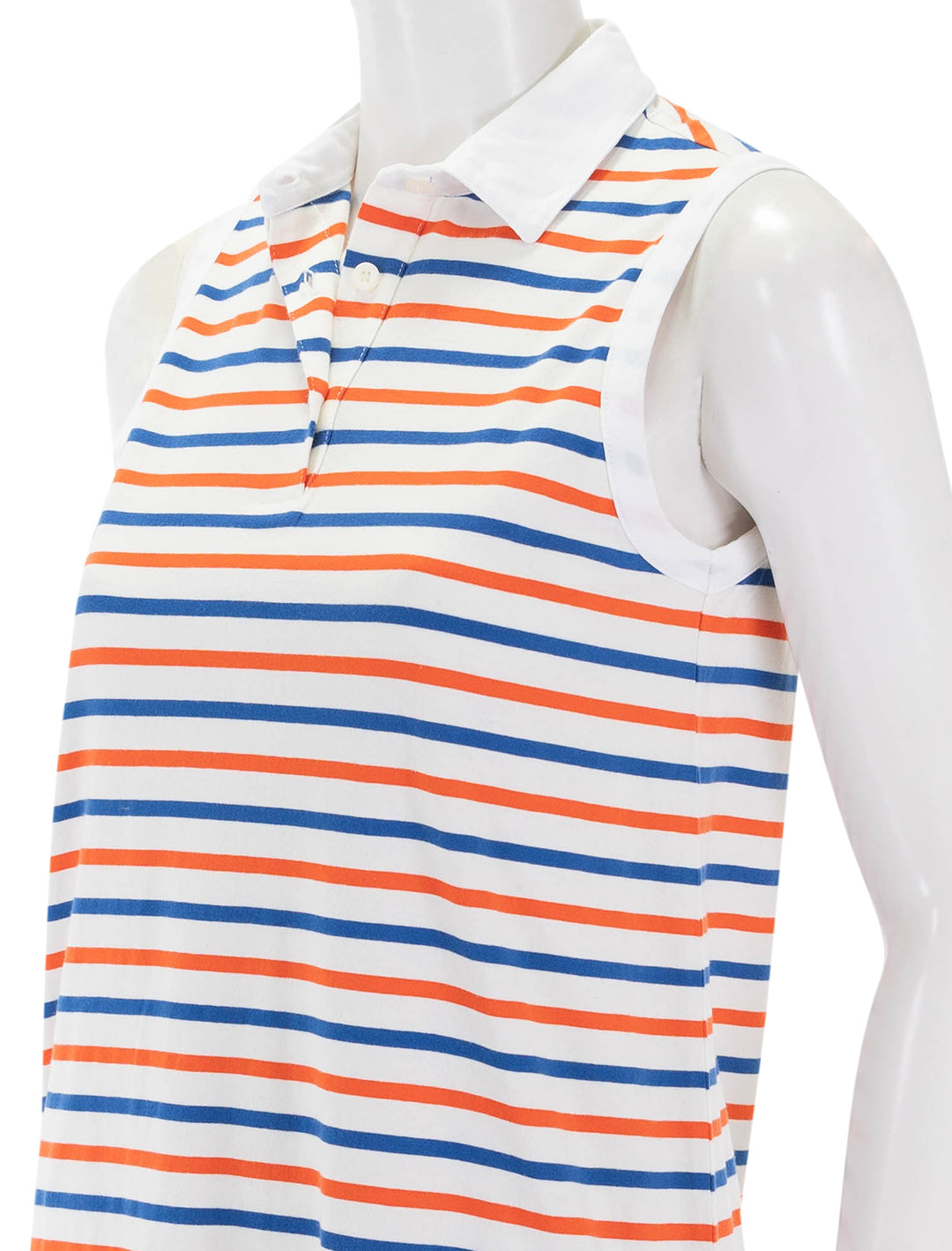 close up view of sleeveless polo dress in white, blue and poppy stripe