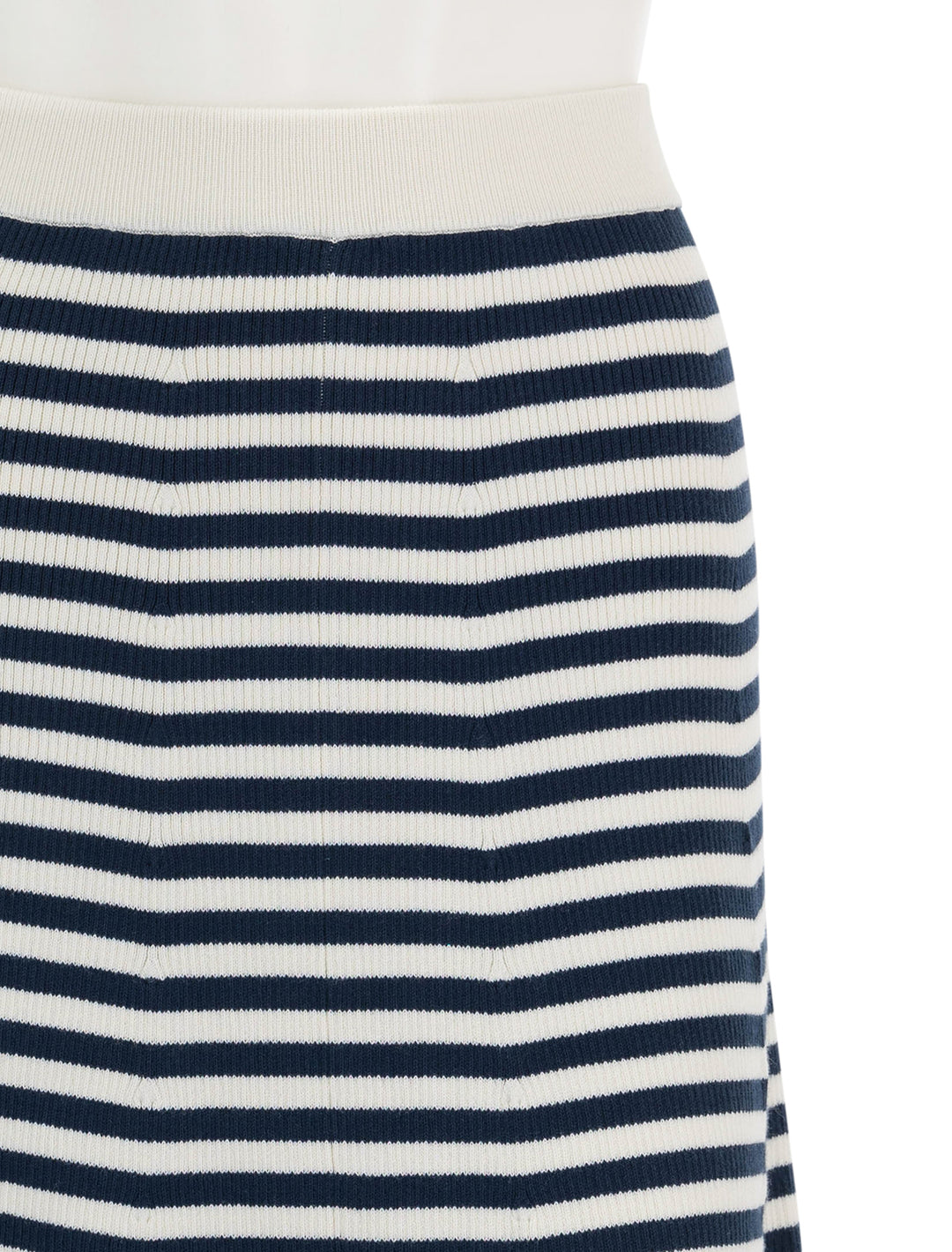 Close-up view of KULE's the sabine skirt in cream and navy stripe.