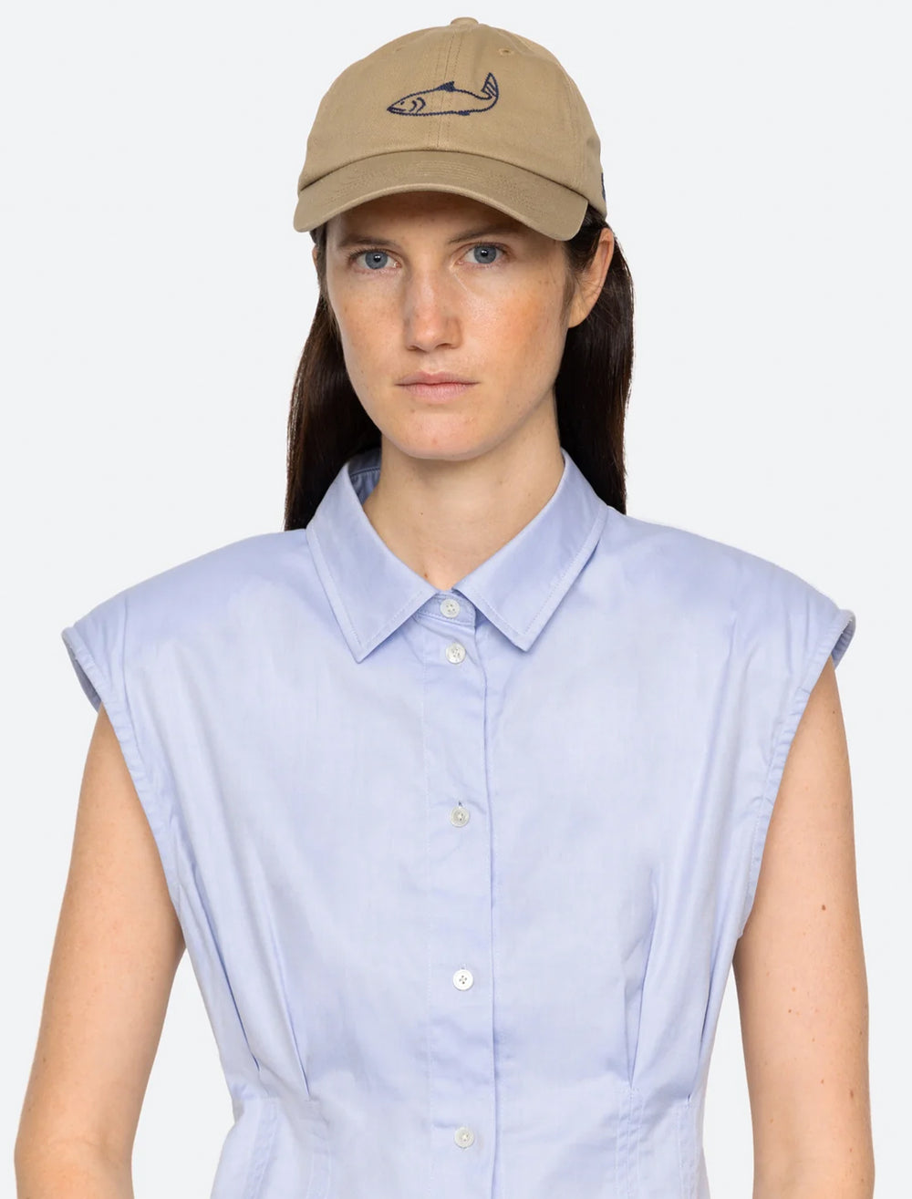 Model wearing Sea NY's demi french workwear cap in camel.