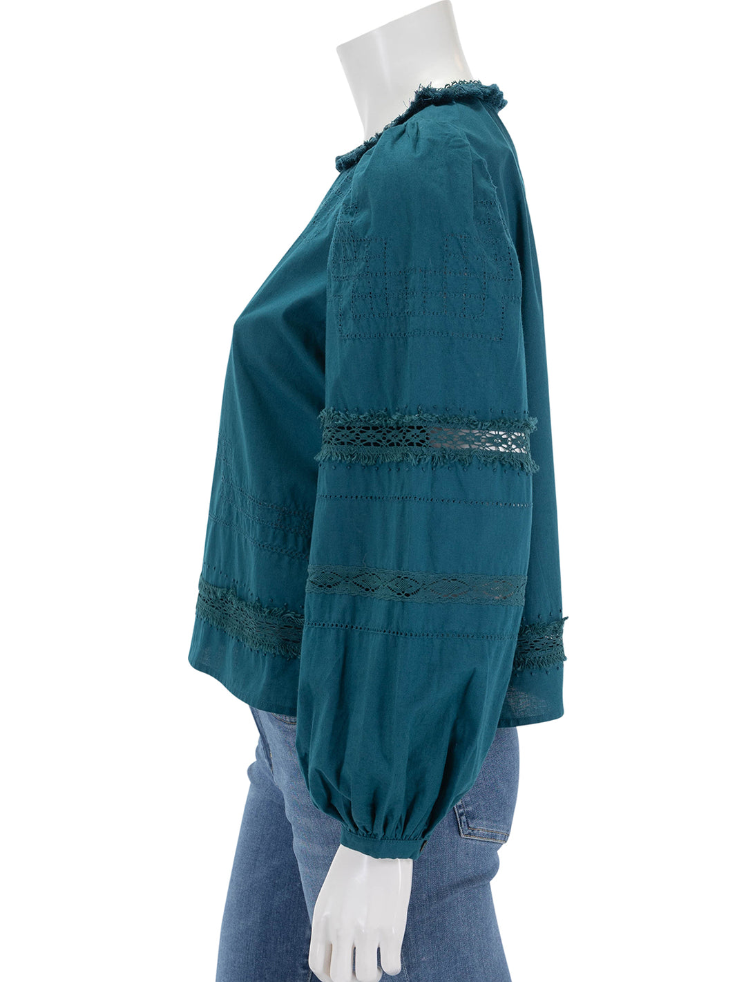 Side view of Sea NY's lilith thread pull long sleeve top in deep teal.