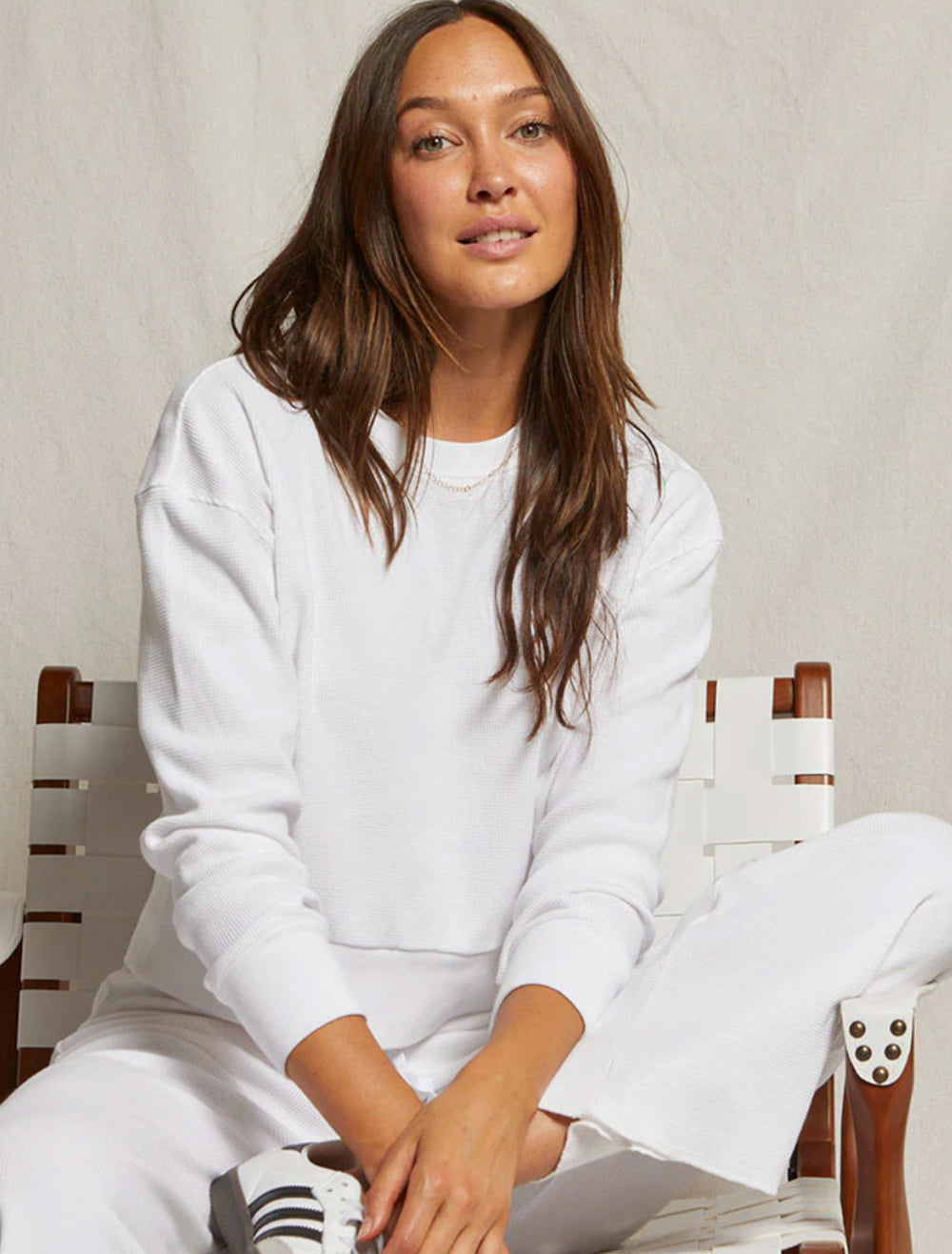 Model wearing Perfectwhitetee's kendall waffle sweatshirt in white.
