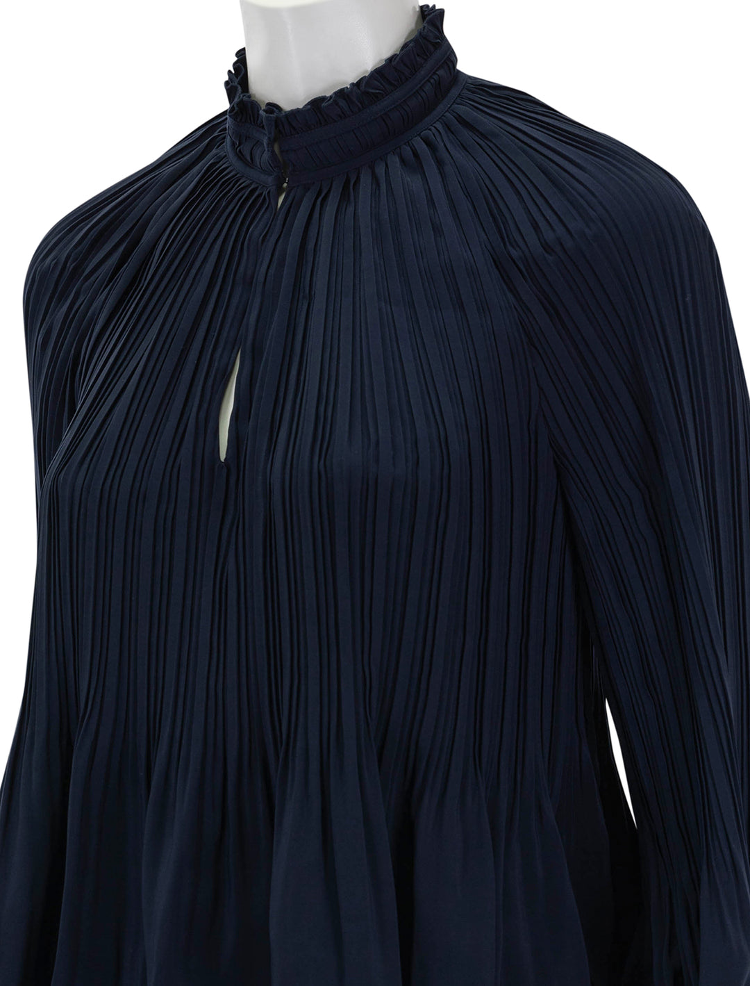 Close-up viewe of Veronica Beard's walker top in navy.