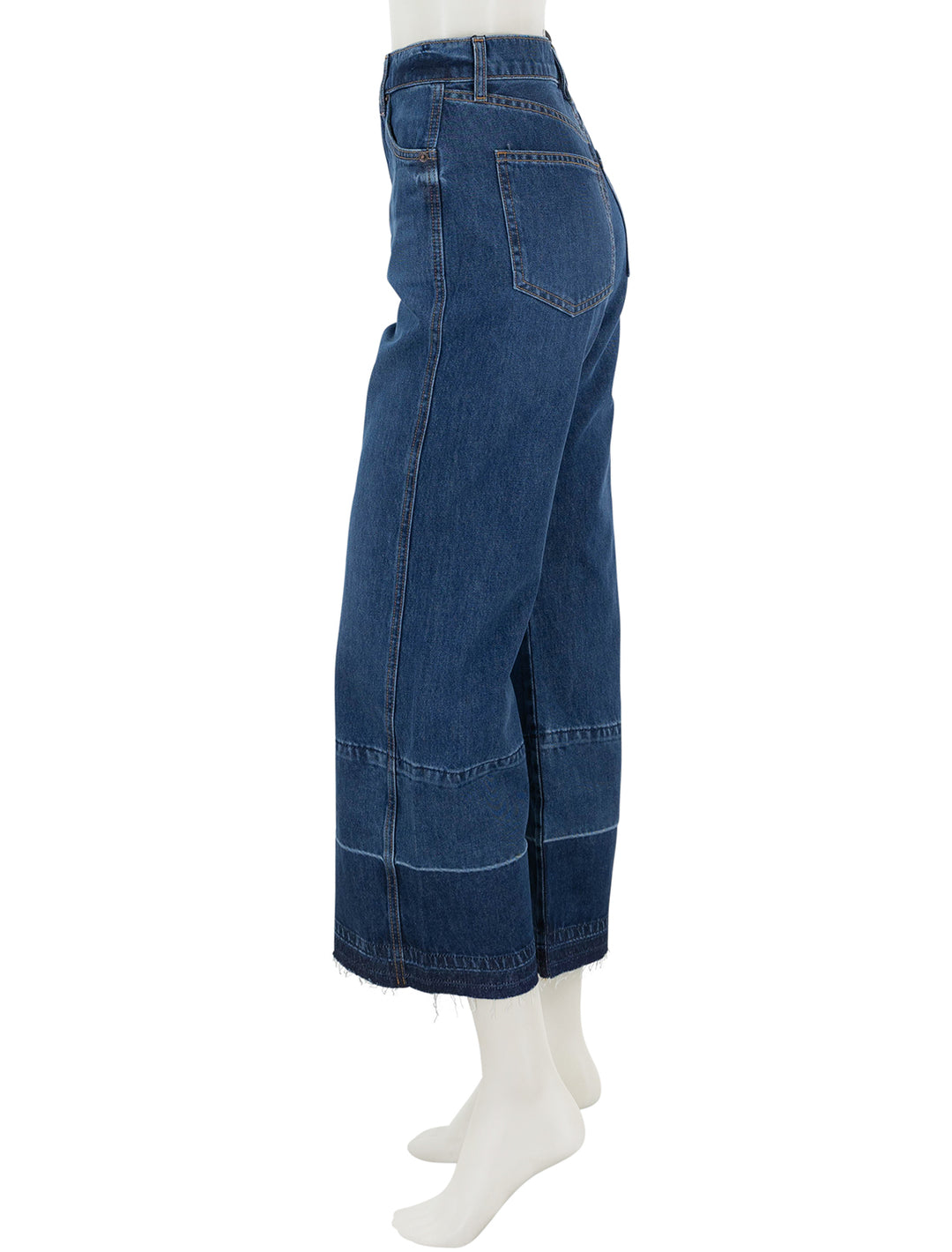 Side view of Veronica Beard's taylor cropped high rise wide leg jeans in bright blue.