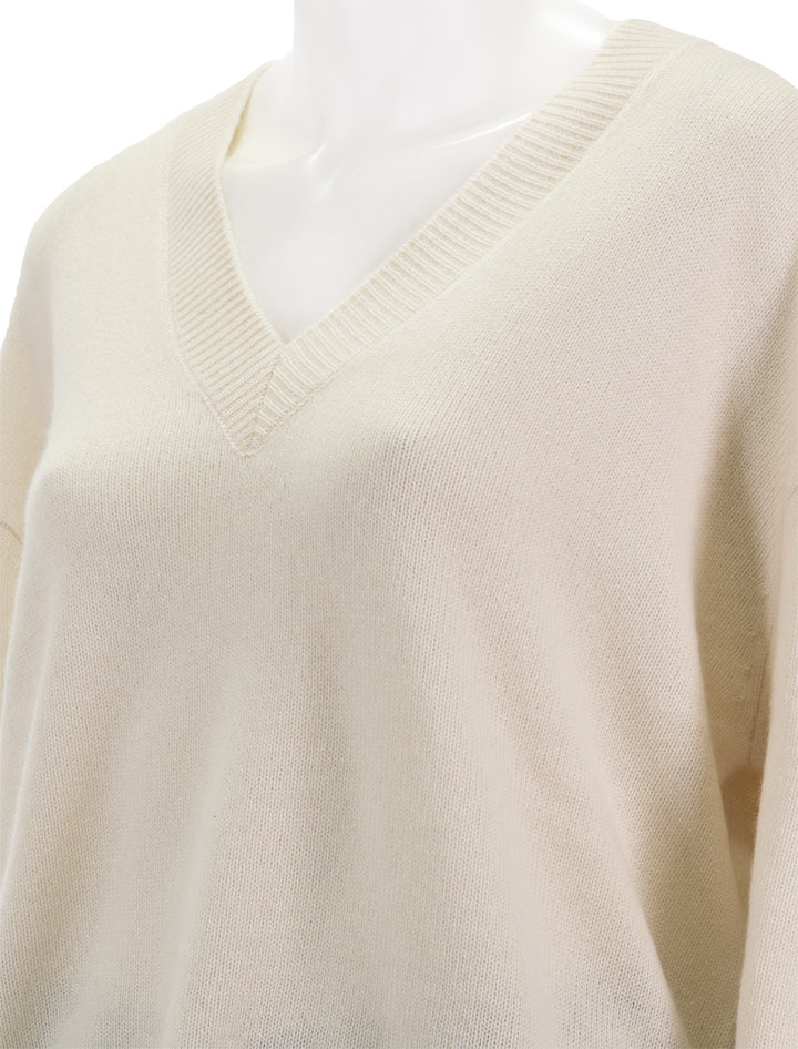 Close-up view of Anine Bing's lee sweater in ivory.