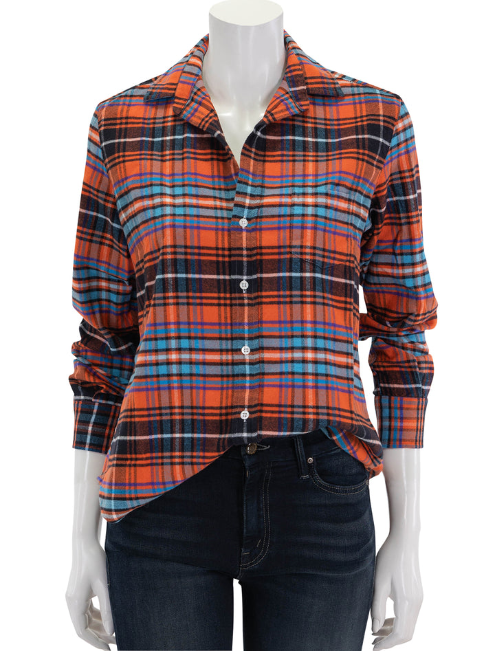 Front view of Frank & Eileen's eileen in orange, blue and black plaid flannel.