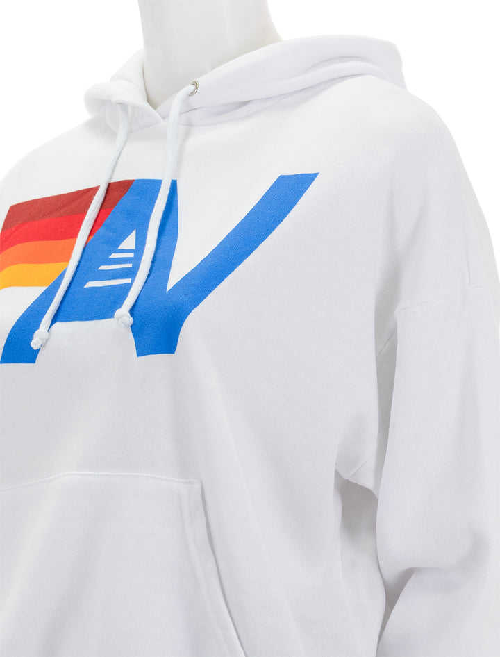 Close-up view of Aviator Nation's logo pullover hoodie relaxed in white.