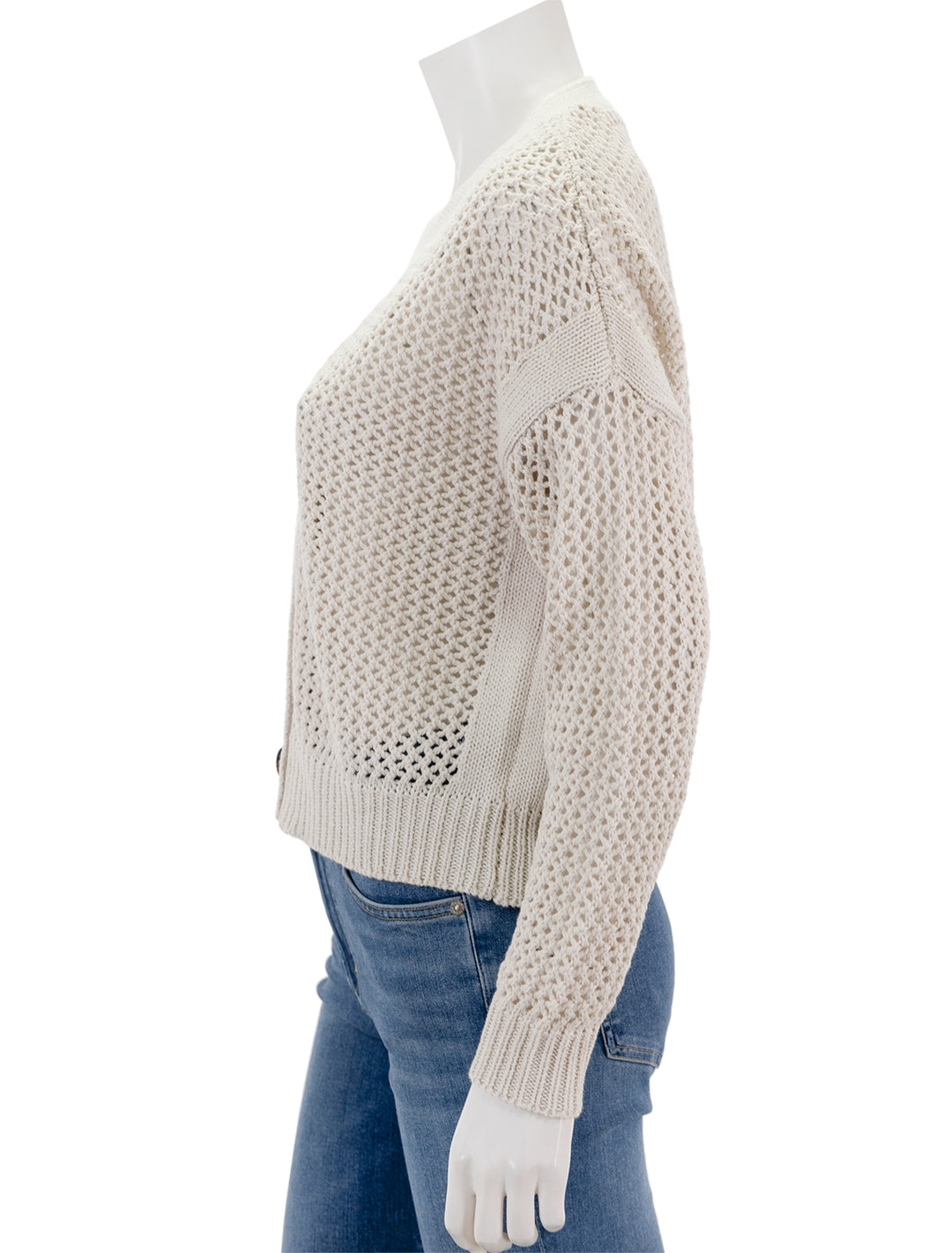 Side view of Self Contrast's maggie fishnet cardigan in seashell.