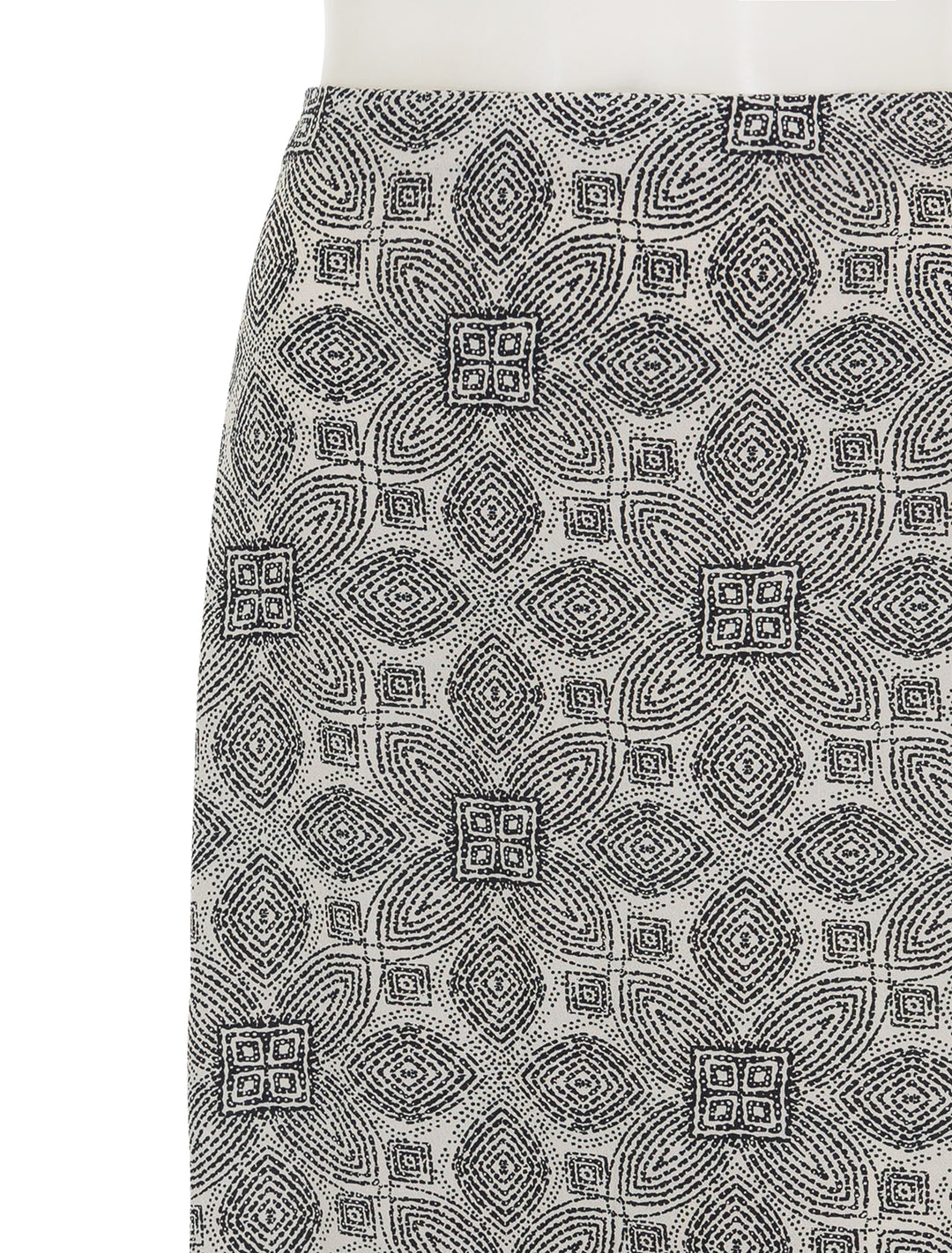 Close-up view of Marine Layer's ryan slip skirt in black and white mandala print.