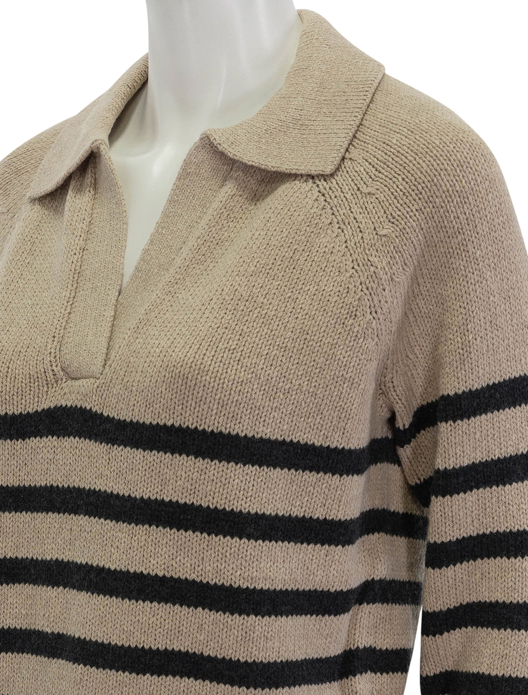 Close-up view of Marine Layer's relaxed polo sweater in neutral stripe.