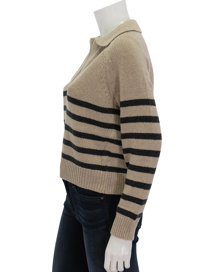 Side view of Marine Layer's relaxed polo sweater in neutral stripe.