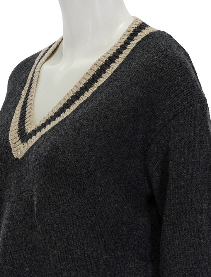 Close-up view of Marine Layer's slouchy vneck sweater in black.