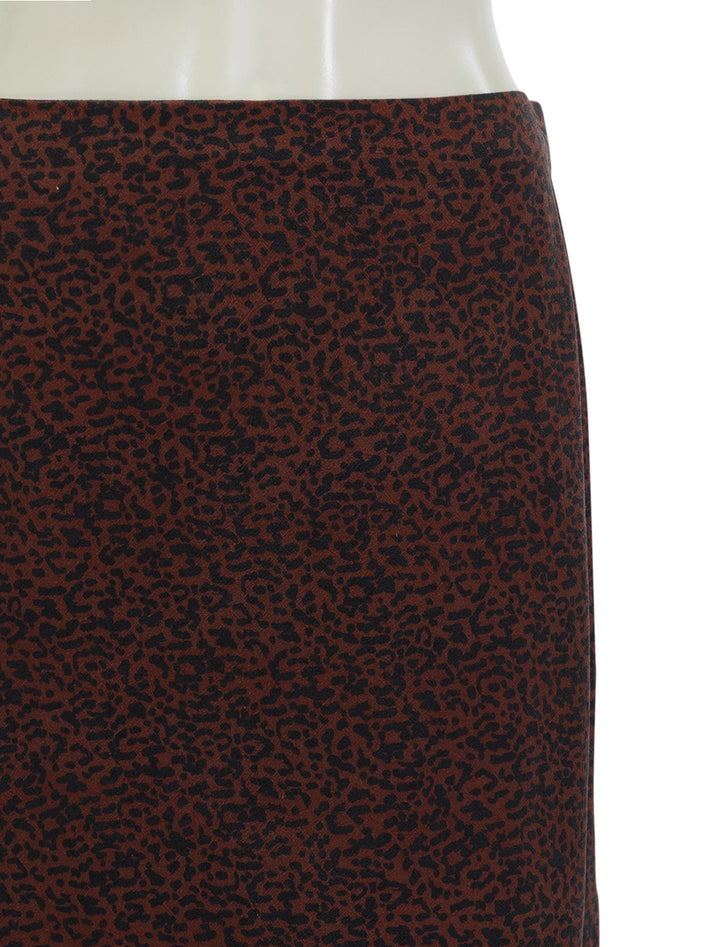 Close-up view of Marine Layer's ryan slip skirt in dark cheetah.