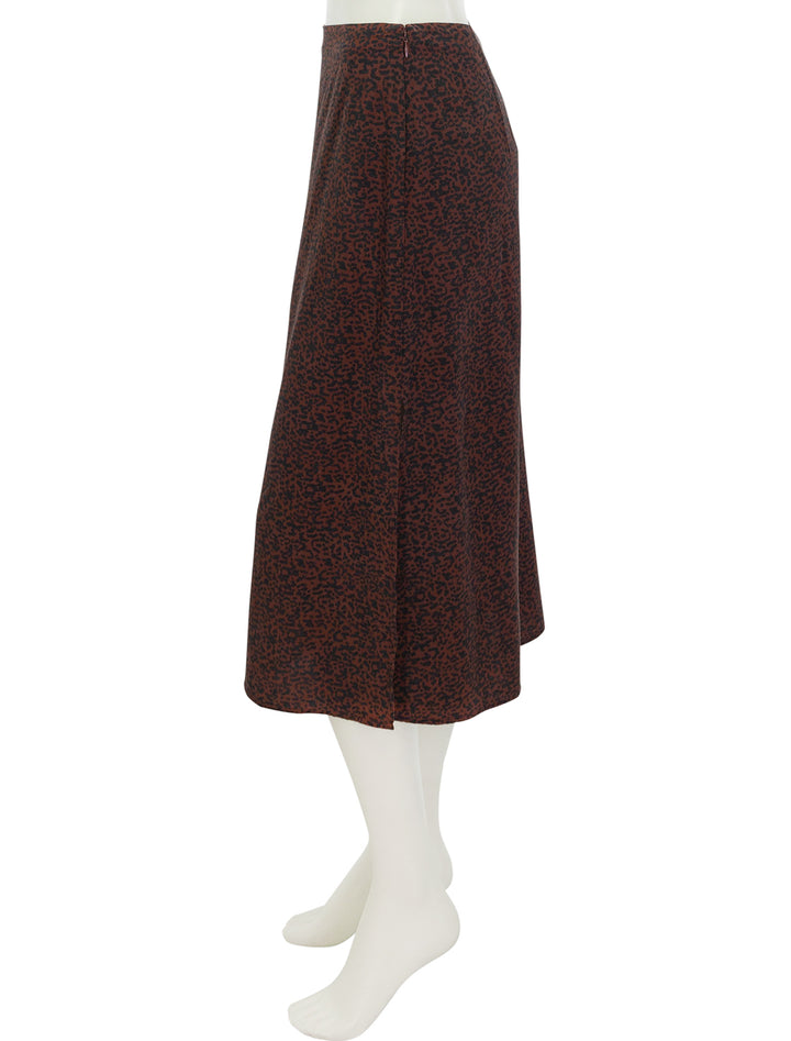 Side view of Marine Layer's ryan slip skirt in dark cheetah.