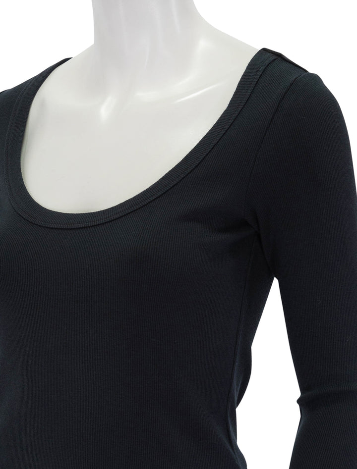 Close-up view of Marine Layer's garment dyed lexi scoop neck in faded black.