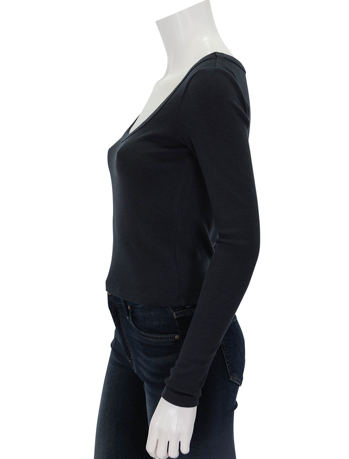 Side view of Marine Layer's garment dyed lexi scoop neck in faded black.