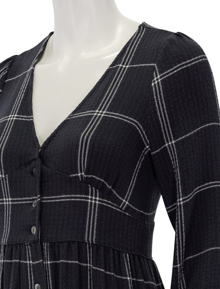 Close-up view of Marine Layer's maeve maxi dress in black windowpane.