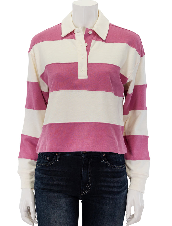 Front view of Marine Layer's rugby polo in raspberry stripe.