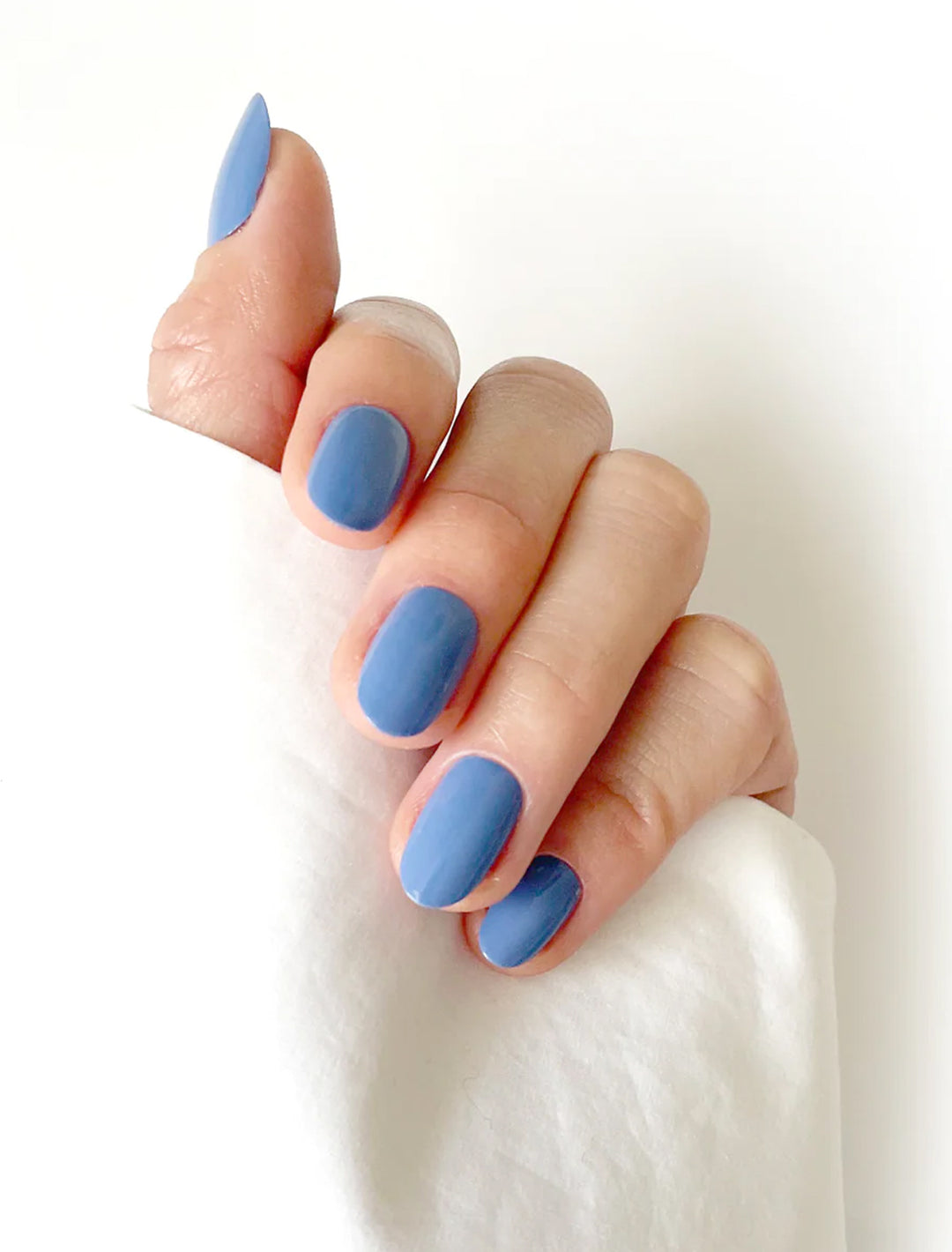 model wearing california bluebell nail polish