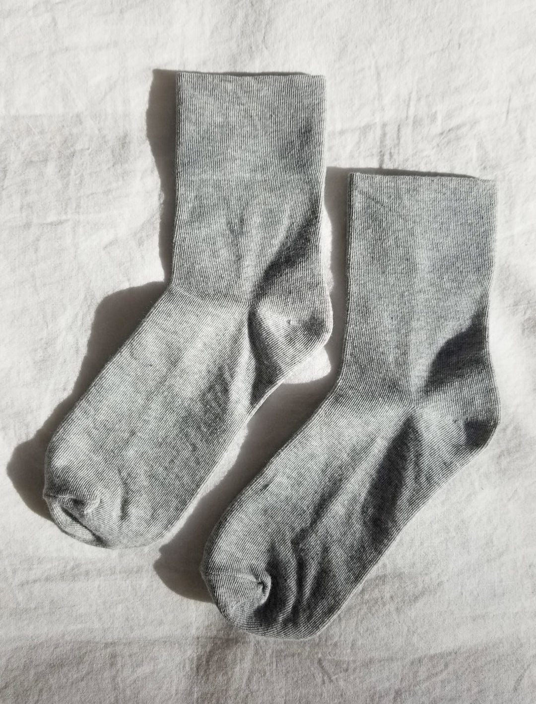 Laydown of Le Bon Shoppe's sneaker socks in heather grey.