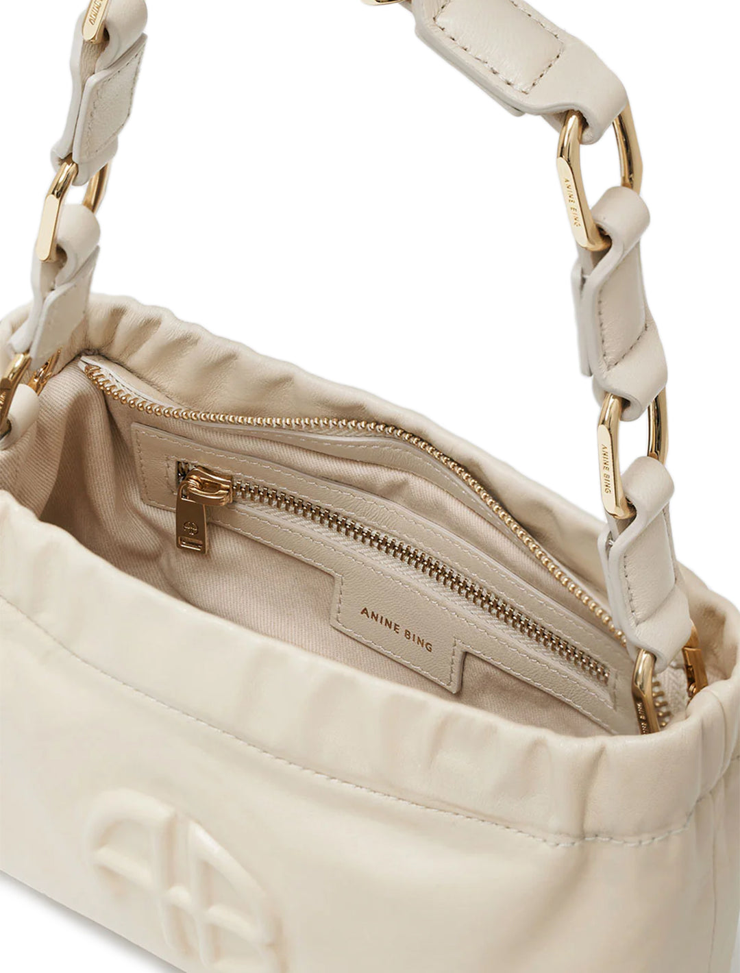 Close-up view of Anine Bing's small kate shoulder bag in ivory.